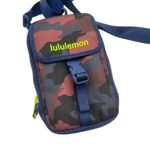 Lululemon Zip-Top Crossbody Bag in a red and blue camouflage pattern
